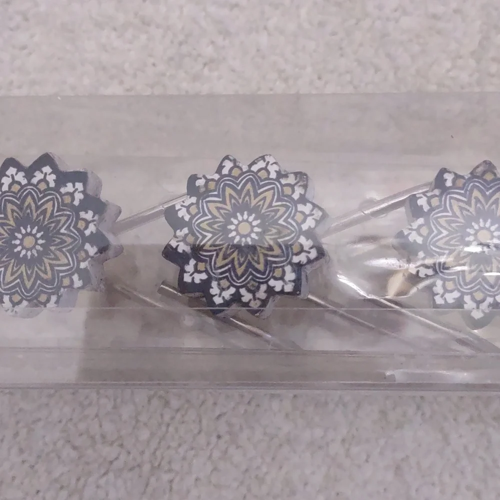 New shower curtain holders